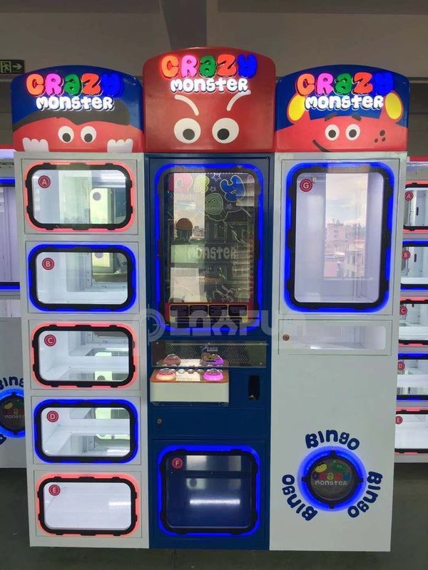 Latest Hot Selling Malls Kids CRAZY BALL MONSTER Claw Gift Coin Operated Grabber Vending Game Machine