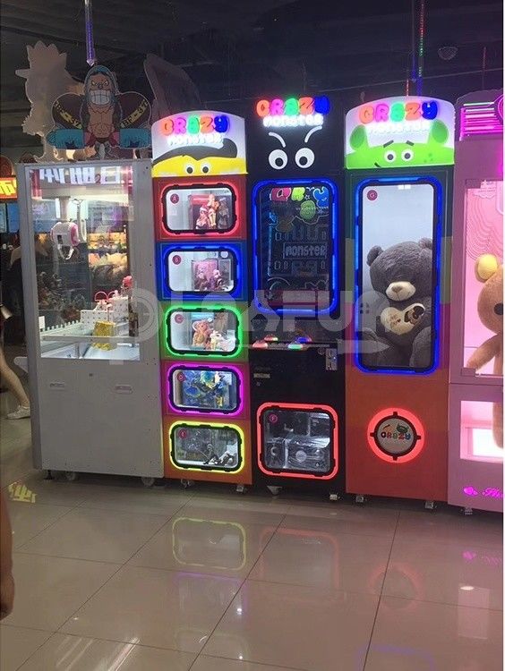 Latest Hot Selling Malls Kids CRAZY BALL MONSTER Claw Gift Coin Operated Grabber Vending Game Machine