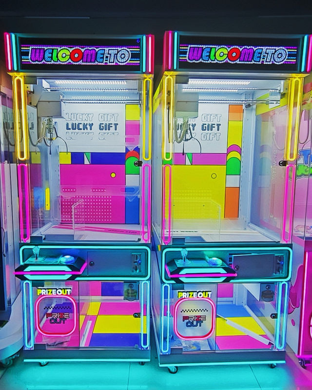 Factory Price Wholesale Kids Transparent Claw Machine with Lucky Gift Box Plush Toy Crane Game