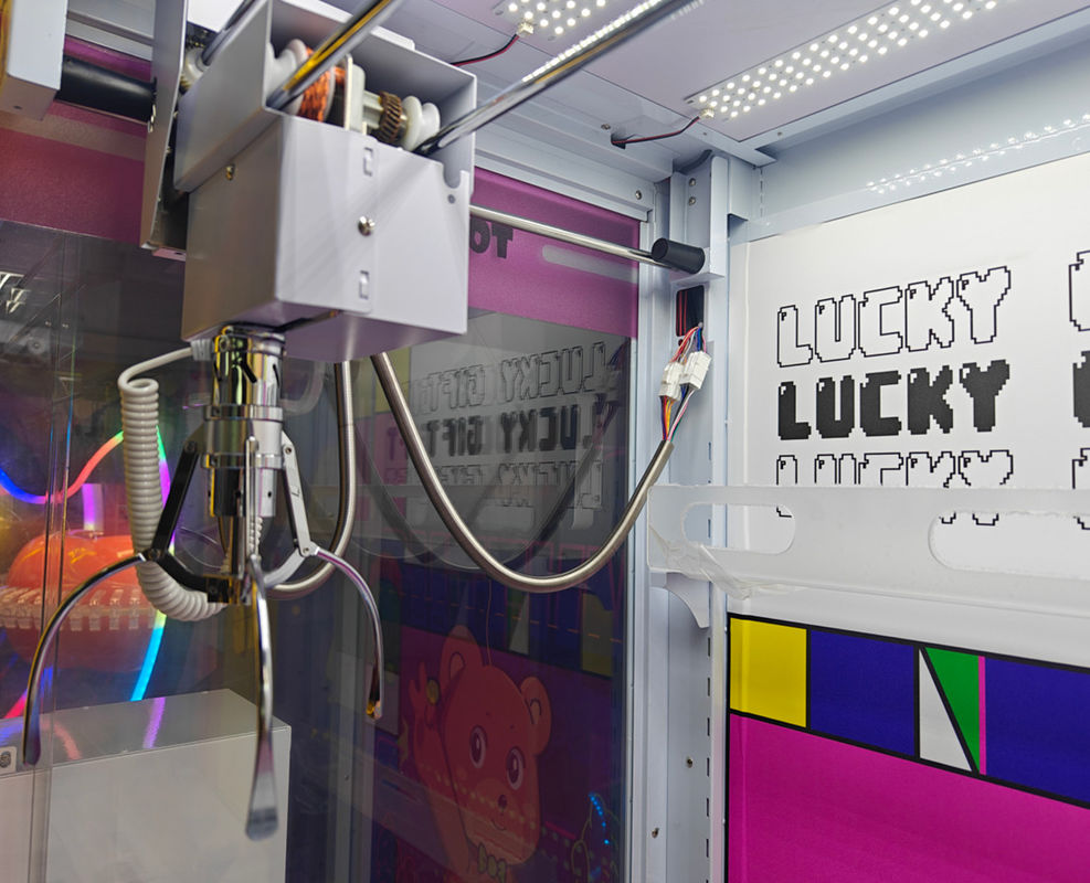 Factory Price Wholesale Kids Transparent Claw Machine with Lucky Gift Box Plush Toy Crane Game